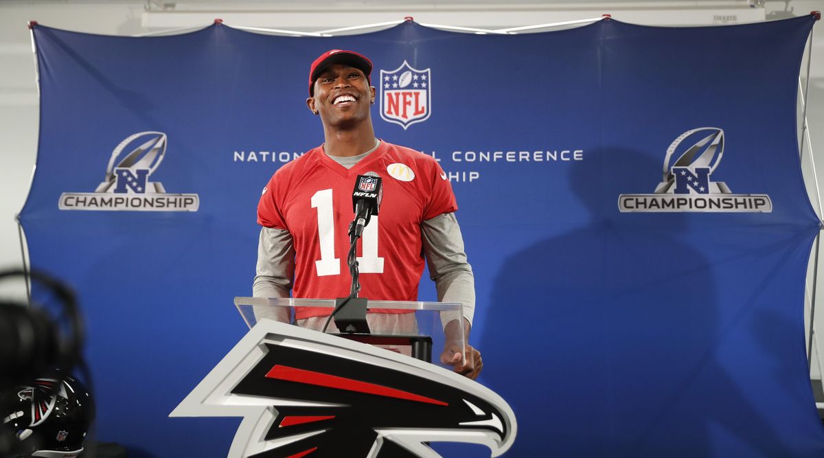 Atlanta Falcons receiver Julio Jones smiles as he answer a question during a news conference before an NFL football practice, Thursday, Jan. 19, 2017, in Flowery Branch, Ga. The Falcons will face the Green Bay Packers in the NFC Championship on Sunday in Atlanta. (John Bazemore / Associated Press)