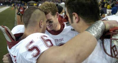 
Alex Brink, center, and teammates celebrate Aple Cup win.
 (SR / The Spokesman-Review)