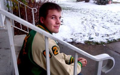 
Lakeland High School senior Josh Wuest, 18, sits at Children's Village in Coeur d'Alene. He volunteers there mowing the lawns and weeding and also helped build sheds and a volleyball court. He persuaded  student body leaders to donate the profits from this winter's Prairie Pig rivalry with Post Falls High School to Children's Village.
 (Kathy Plonka / The Spokesman-Review)