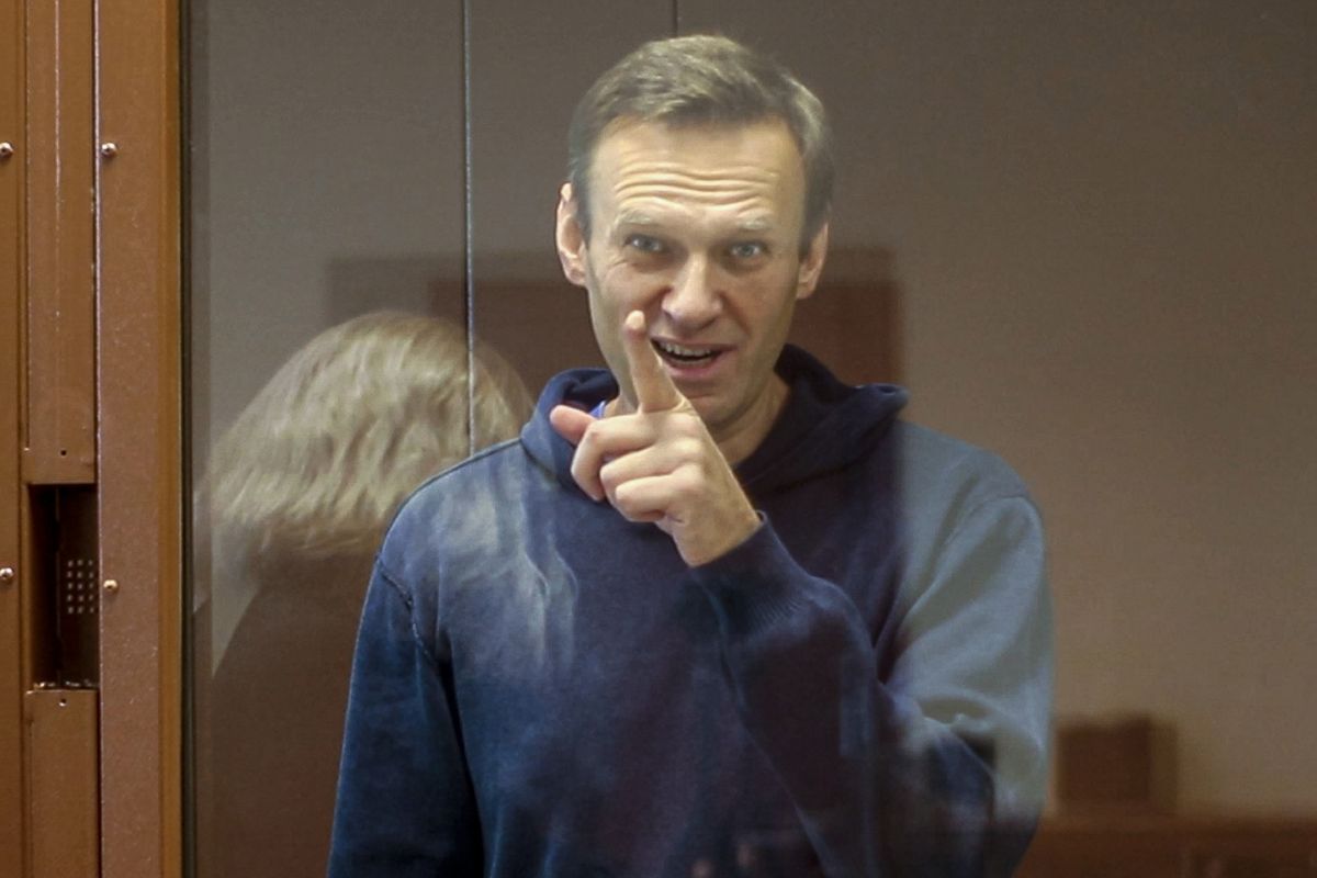 FILE - In this Feb. 16, 2021, file photo taken from footage provided by the Babuskinsky District Court, Russian opposition leader Alexei Navalny gestures during a court hearing in Moscow, Russia. Several doctors were prevented Tuesday, April 20, from seeing Navalny in a prison hospital after his three-week hunger strike, and prosecutors also detailed a sweeping, new case against his organization.  (HOGP)