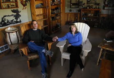 
Gary and Patti Gabrick at their shop, Spirit Lake Sawworks. Gary Gabrick says the best-selling item is the Adirondack chair.
 (Kathy Plonka / The Spokesman-Review)