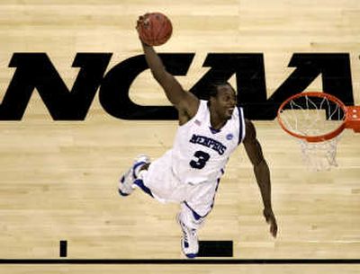 
Memphis forward Joey Dorsey goes up for a resounding dunk. Associated Press
 (Associated Press / The Spokesman-Review)