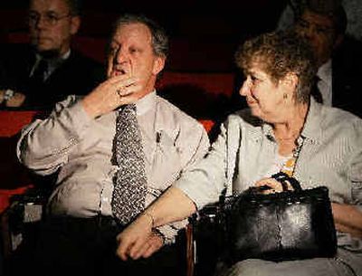
Terry Hicks, comforted by his wife, Beverly, rests after his son David Hicks' appearance before the tribunal. 
 (Associated Press / The Spokesman-Review)