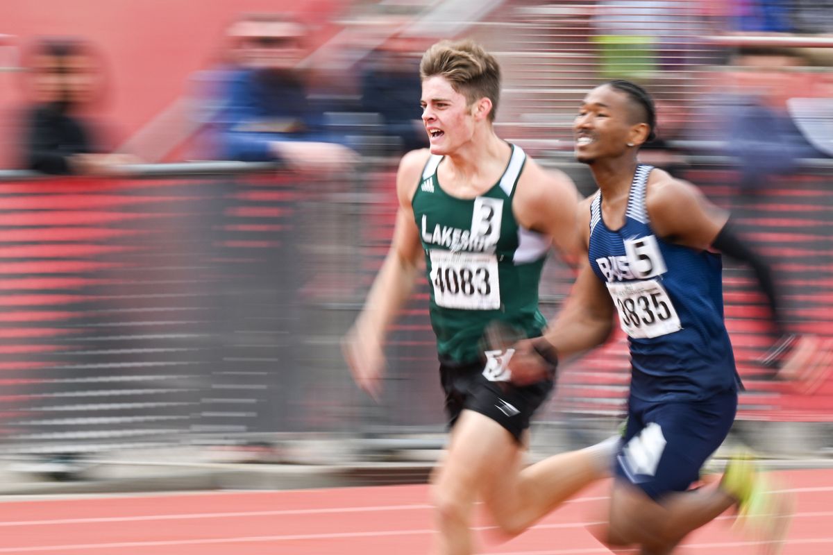 Lakeside’s Hayden Blank leads Bush’s Amare Fields in the 1A Boys 800m prelim to make it into Saturday’s finals race during the 2022 Track And Field State Championship on Friday, May 27, 2022, at EWU’s Roos Field in Cheney, Wash.  (Tyler Tjomsland/The Spokesman-Review)