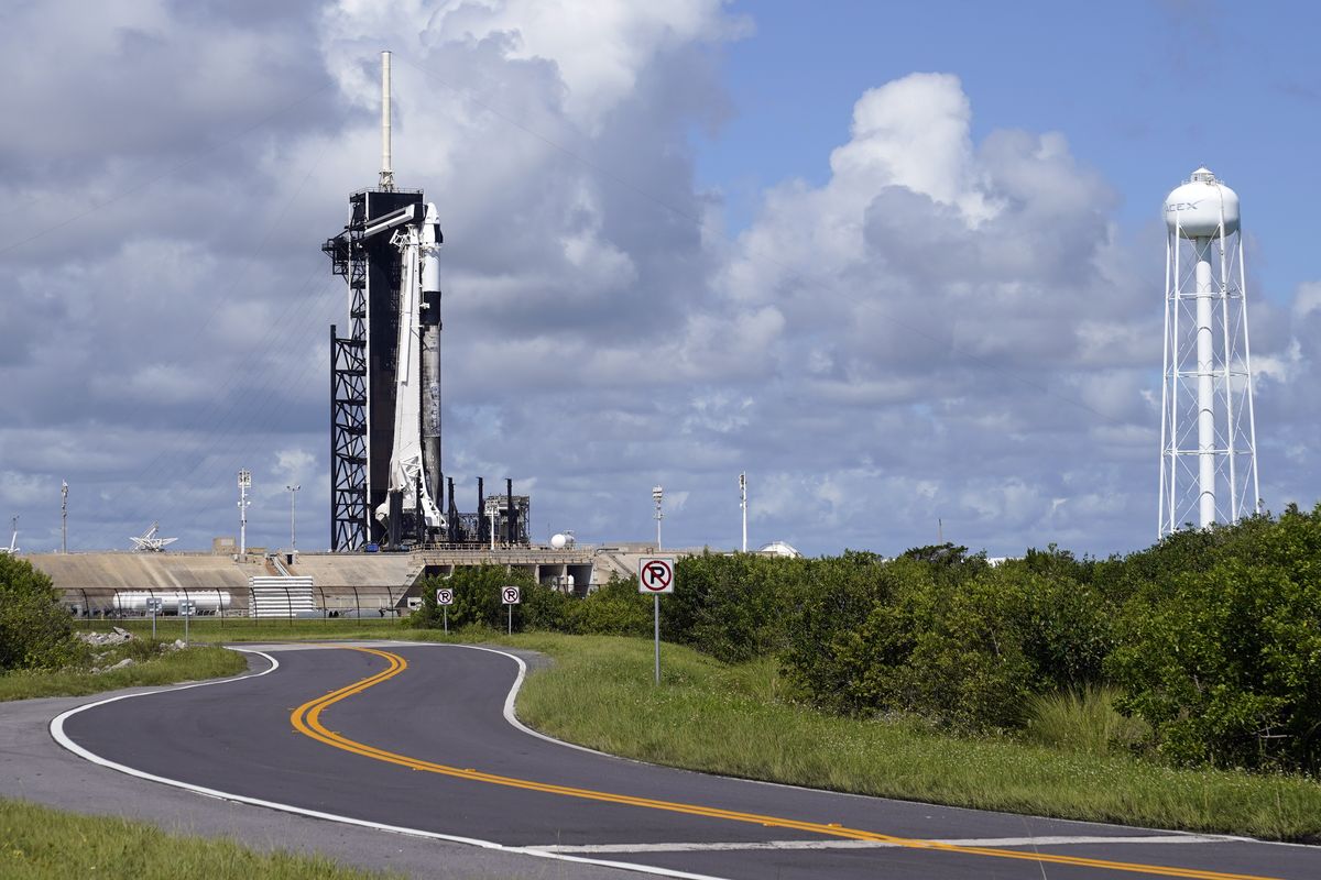 A SpaceX Falcon 9 rocket sits on pad 39A at the Kennedy Space Center in Cape Canaveral, Fla., Wednesday, Sept. 15, 2021. For the first time in 60 years of human spaceflight, a rocket is poised to blast into orbit with no professional astronauts on board, only four tourists.  (John Raoux)
