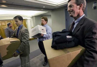 
FBI agents remove boxes from the Office of the Special Counsel Scott Bloch in downtown Washington after a subpoena search of Bloch's work area and computers on Tuesday. Associated Press
 (Associated Press / The Spokesman-Review)