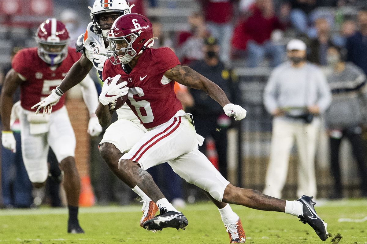Alabama wide receiver DeVonta Smith (6) breaks free for a touchdown against Auburn during an NCAA college football game Saturday, Nov. 28, 2020, in Tuscaloosa, Ala.  (Associated Press)