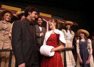 
Members of the cast, back row, from left, Kristin McKernan as Katie, Hannah Conley as Mrs. Smith, Michael Braun as Mr. Smith, Ashley VavRosky as Agnes Smith and Kaelee Toth as Tootie Smith, watch as Anna Daines as Esther Smith sings to  Dane Ficklin as John Truitt during play rehearsal for 