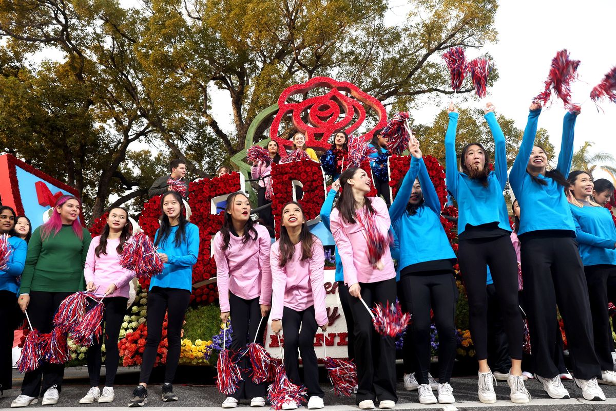 Performers rally the crowd Monday during the Tournament of Roses Parade on Orange Grove Boulevard in Pasadena, Calif. (Tribune News Service)
