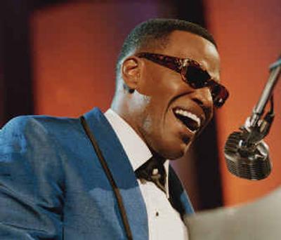 
RAY: Jamie Foxx portrays musician Ray Charles. Foxx took the top male acting honors for the film from the National Board of Review.
 (Associated Press photos / The Spokesman-Review)