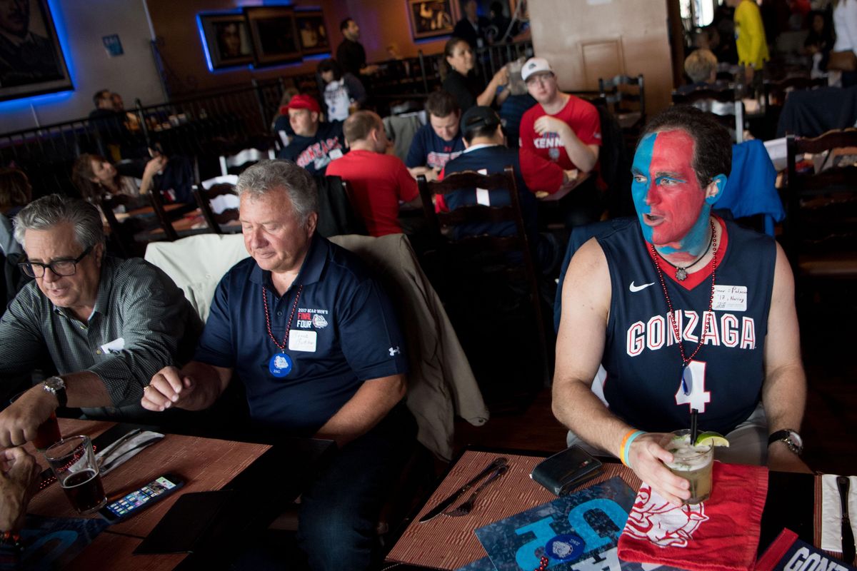 Connor Palacio, a recent Gonzaga grad, mingles with fellow alums during a  gathering  before Thursday’s game  at the Staples Center in Los Angeles. (Tyler Tjomsland / The Spokesman-Review)