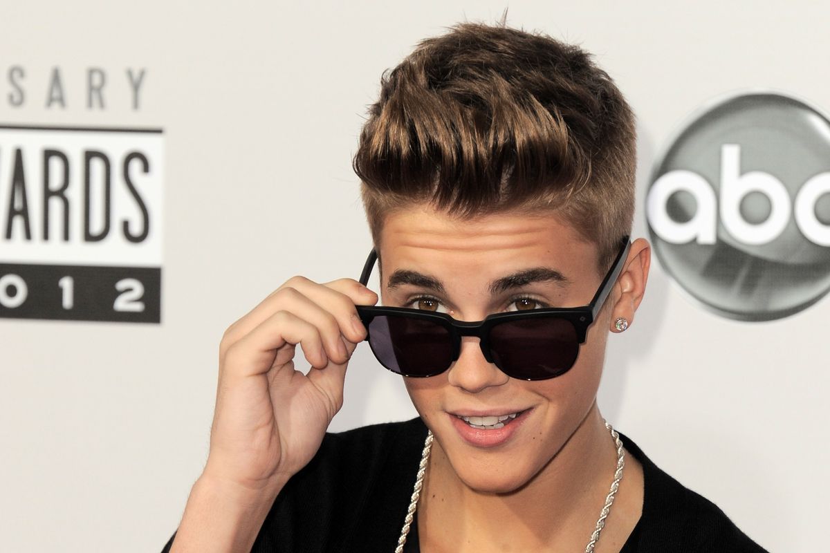Justin Bieber arrives at the 40th Anniversary American Music Awards on Sunday, Nov. 18, 2012, in Los Angeles. (Photo by Jordan Strauss/Invision/AP) (Jordan Strauss / Invision)