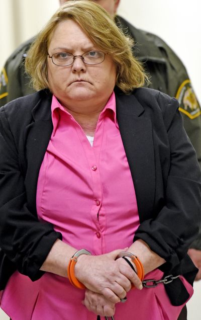 Joyce Hardin Garrard is led back to jail in Gadsden, Ala., on Friday after being found guilty of capital murder. (Associated Press)