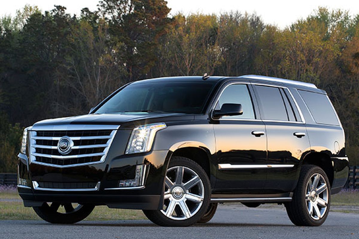 Longer than last year by 1.4 inches, wider by 1.5 inches and heavier by about 100 pounds, the 2015 Escalade (from $72,690, including destination) carries eight, tows up to 8,300 pounds and accelerates from zero to 60 in 6.1 seconds. (Cadillac)