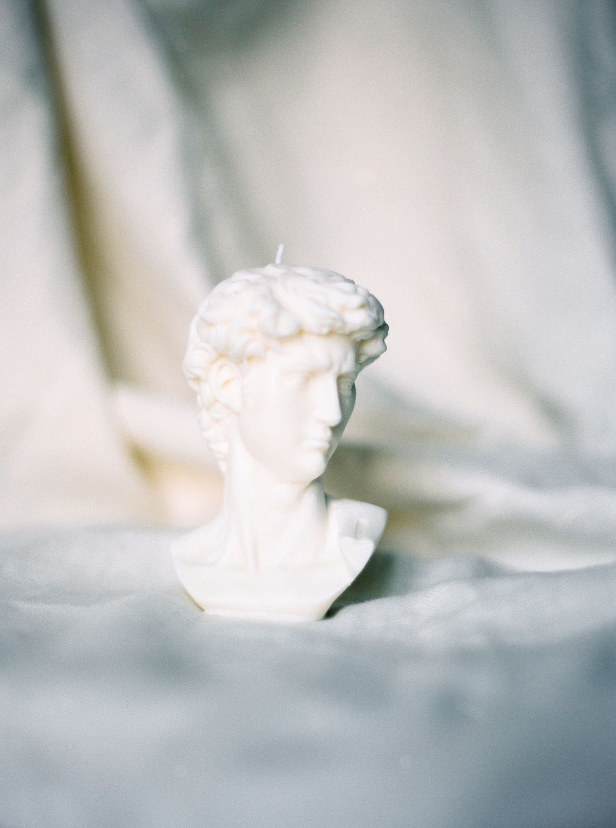 Sculptural candles, such as in the shape of neoclassical busts, are “a way for people at home to reinvent their spaces,” says Etsy’s Dayna Isom Johnson.  (Etsy/SouvenirsDeSoie)