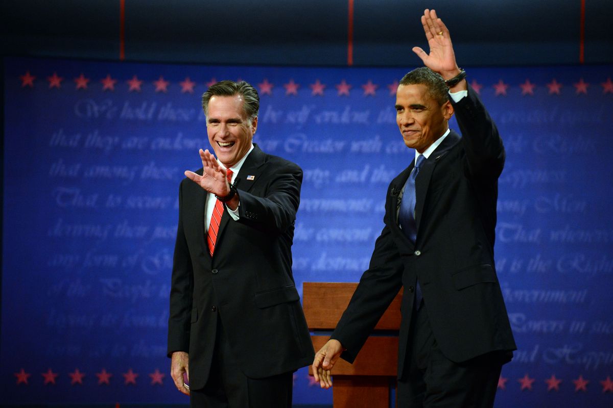 President Barack Obama and former Massachusetts Governor Mitt Romney wave at the start of the presidential debate at the University of Denver Wednesday, Oct. 3, 2012, in Denver. (John Leyba / The Denver Post)