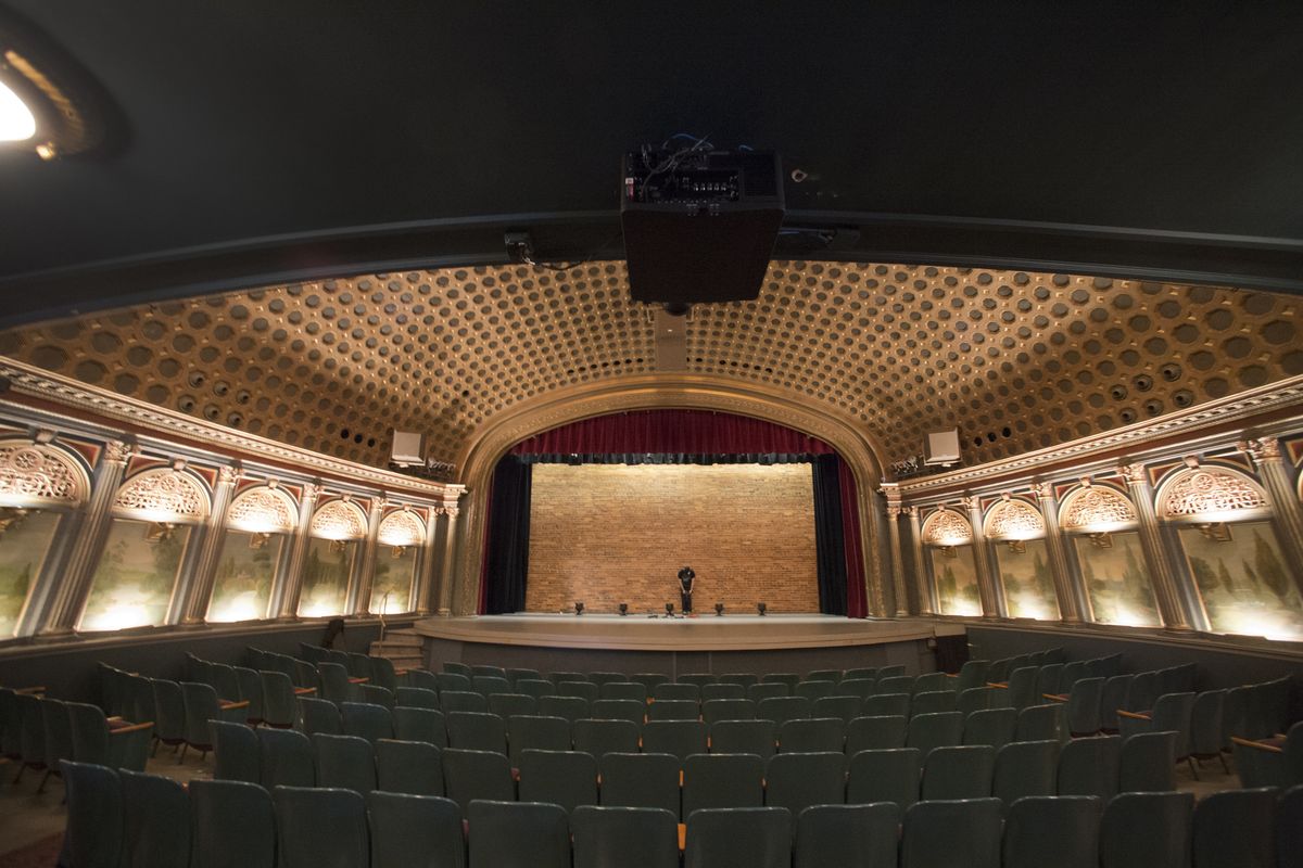 The historic Bing Crosby Theater now has a state-of-the-art projector, mounted under the balcony, above, and a sound system that was designed for the space with a digital 32-channel soundboard. The new installations allow for theater quality sound for movies and performances without adding speakers on the stage. (Jesse Tinsley)