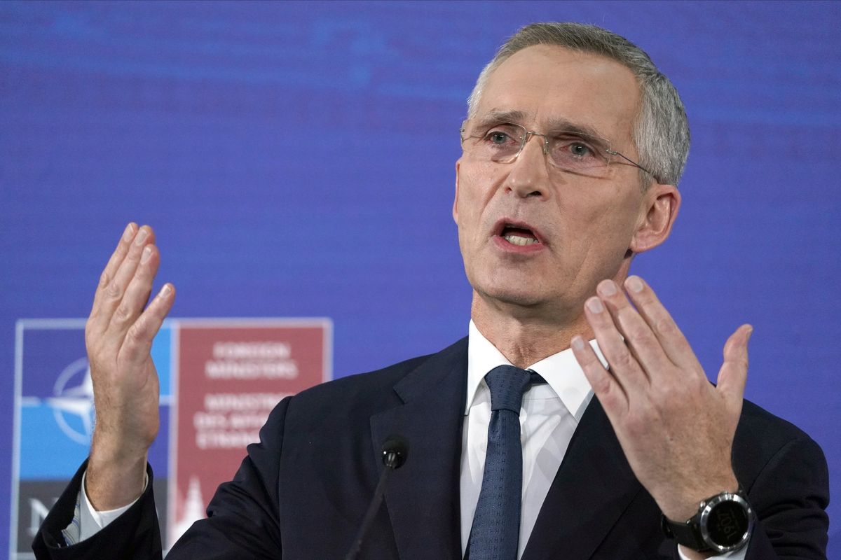 NATO Secretary General Jens Stoltenberg gestures while speaking to the media during a news conference on the sideline of the NATO Foreign Ministers meeting in Riga, Latvia Tuesday, Nov. 30, 2021.  (Roman Koksarov)