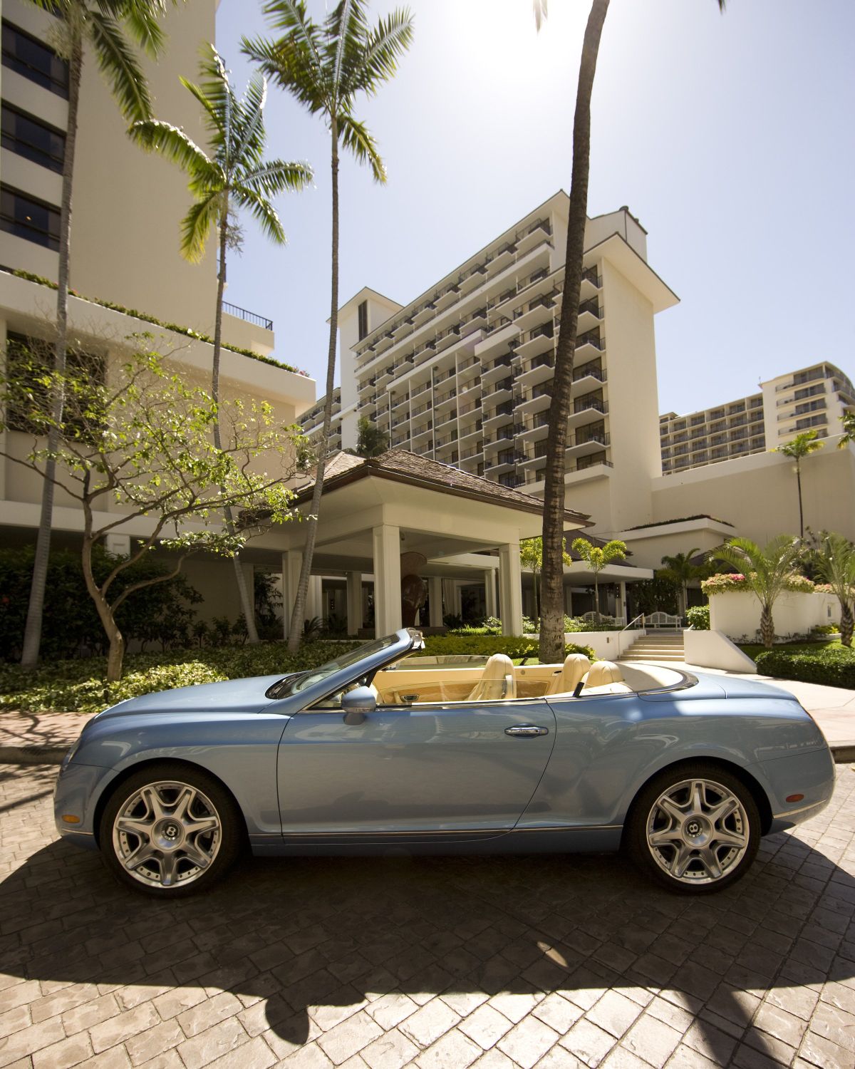 Above: A convertible Bentley belonging to the exclusive Halekulani hotel sits outside the hotel in Honolulu. (The Spokesman-Review)