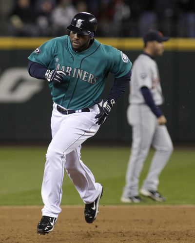 Milton Bradley rounds the bases after his two-run homer. (Associated Press)