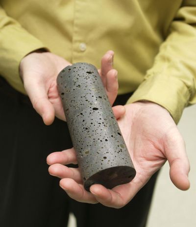 A basalt rock core sample is seen Nov. 30, 2005, at the Pacific Northwest National Laboratory in Richland, Wash. Eight scientists at PNNL have made the latest list of scientists whose research has the most influence worldwide in their fields of expertise. (JACKIE JOHNSTON / Associated Press)