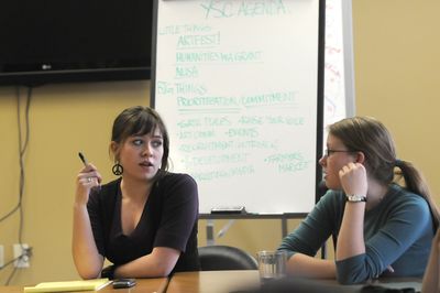 Taylor Weech,  left, of the Spokane Youth Sustainability Council, and Sabina Noll share ideas at a meeting last Thursday.  (Jesse Tinsley / The Spokesman-Review)