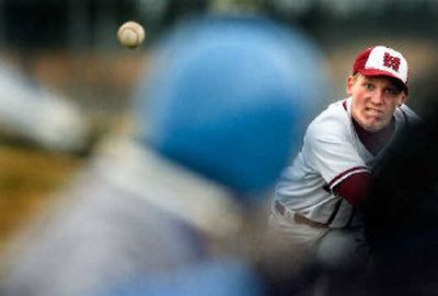 
Mt. Spokane pitcher Jason Gravos bears down on a Central Valley batter in Tuesday's doubleheader. 
 (Christopher Anderson / The Spokesman-Review)