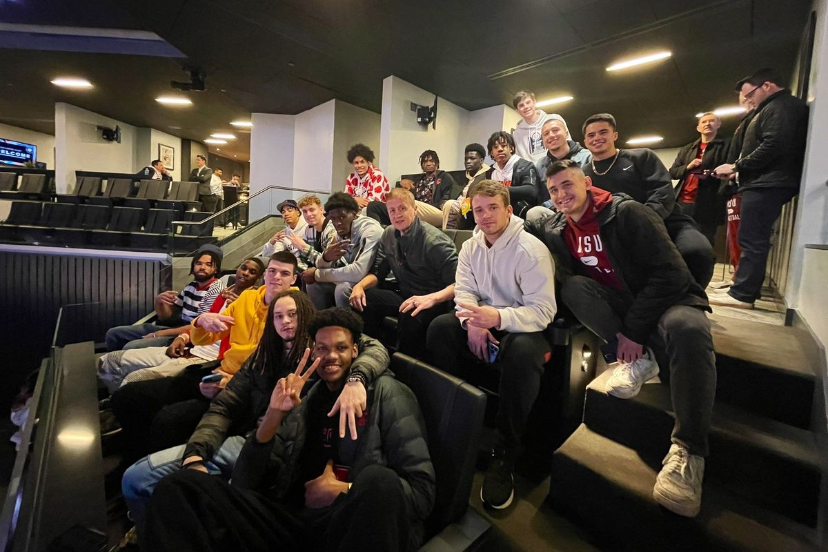 The Washington State basketball team poses for a picture at the Barclays Center during an NBA game between the Brooklyn Nets and Charlotte Hornets on Sunday in Brooklyn.  (WSU Athletics)