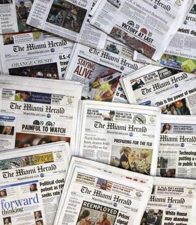 Copies of the McClatchy Co. owned Miami Herald newspaper in Miami are seen in this October 2009 photo. McClatchy Co., the publisher of the Miami Herald, The Kansas City Star and dozens of other newspapers across the country is filing for bankruptcy protection.   (Wilfredo Lee)