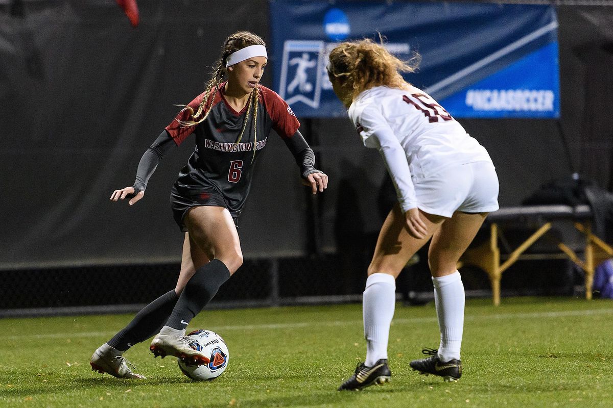 Washington State’s Morgan Weaver dribbles past a Montana defender during an NCAA  Tournament first-round game last Friday  in Pullman. (WSU Athletics / Courtesy)