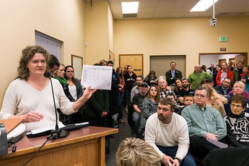 During a Coeur d'Alene School District board meeting Monday at the Midtown Center, Susan Moss, a local attorney, makes a request of board members to add language to the current policy that would protect LGBT employees from discrimination. (Shawn Gust/press)