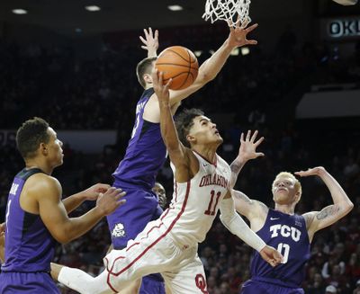 Oklahoma’s Trae Young leads the nation in scoring at 30.1 points per game. (Garett Fisbeck / AP)