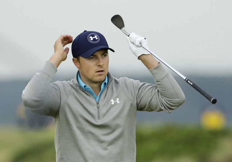American Jordan Spieth misses with a chip shot on the 15th hole in the final round Monday. (Associated Press)
