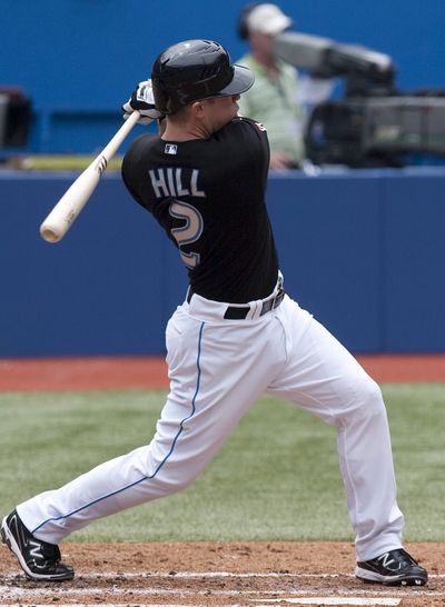 Toronto’s Aaron Hill hits his first career grand slam. (Associated Press)