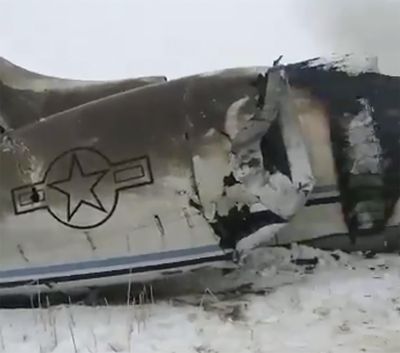 An aircraft that crashed in eastern Afghanistan on Monday, Jan. 27, 2020. The U.S. military says it is investigating reports of an airplane crash in Taliban-controlled territory in Afghanistan. U.S. Army Maj. Beth Riordan, a spokeswoman for U.S. Central Command, said that it remained unclear whose aircraft was involved in the crash. (Tariq Ghazniwal)