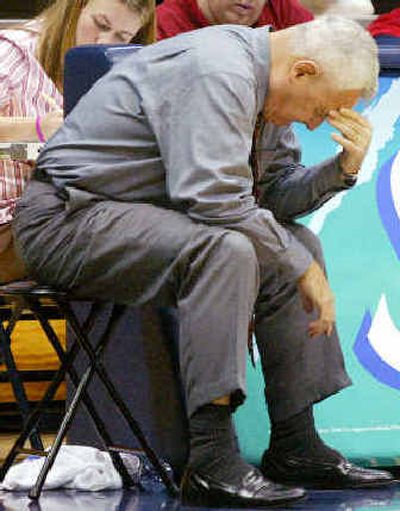 
Washington State coach Dick Bennett has trouble watching the final moments of his Cougars' 63-57 overtime loss to California. 
 (Associated Press / The Spokesman-Review)