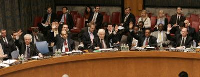 
Representatives of the U.N. Security Council  vote on a resolution to impose sanctions against Iran  on Saturday at U.N. headquarters. 
 (Associated Press photos / The Spokesman-Review)