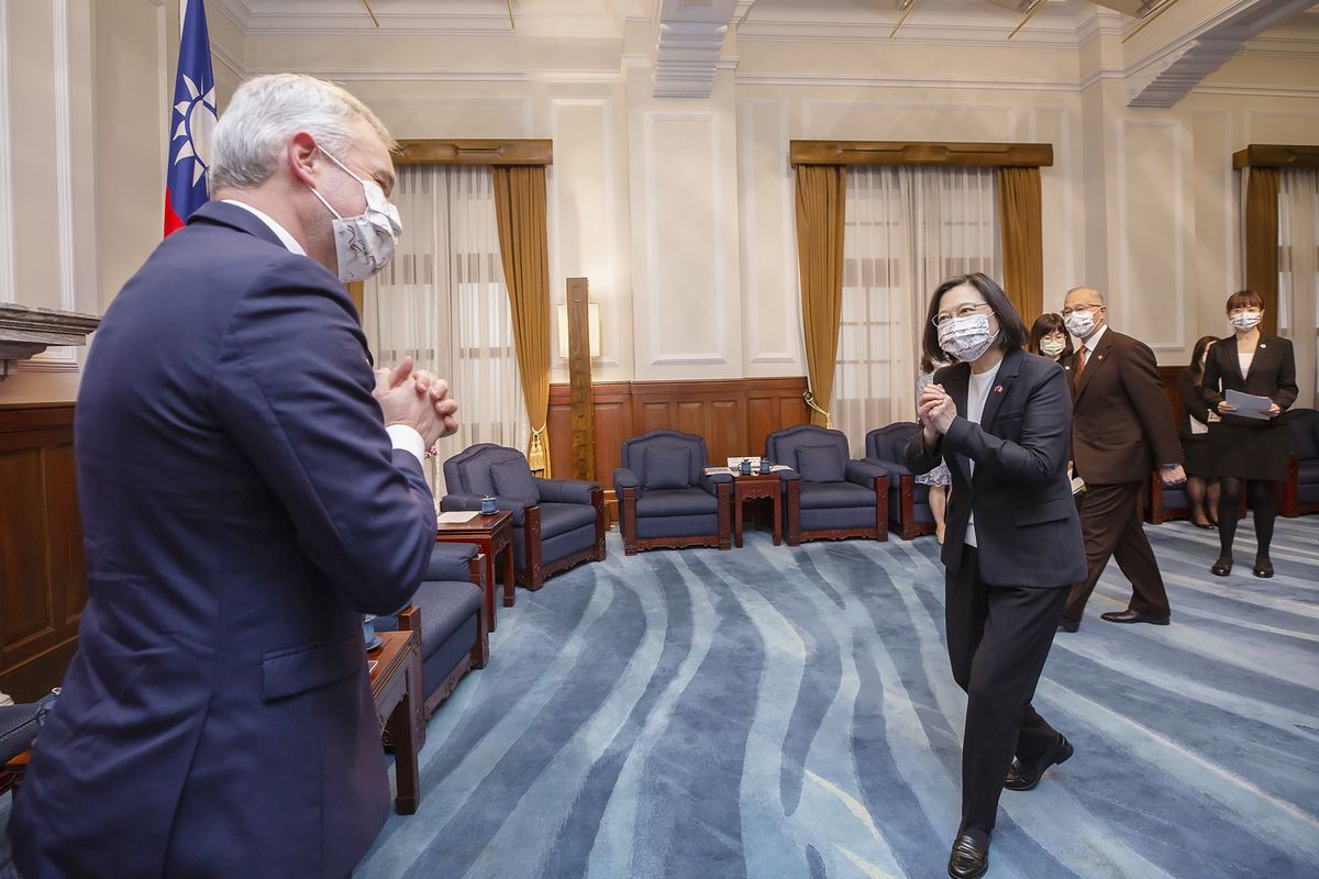 In this photo released by the Taiwan Presidential Office, Taiwan president Tsai Ing-wen, right, greets Francois de Rugy, the head of the Taiwan Friendship group in the National Assembly, the lower house of France