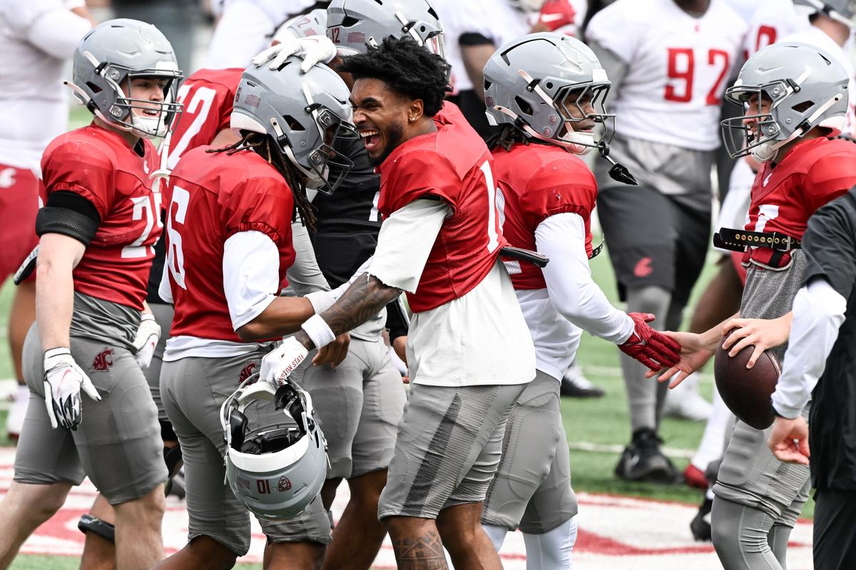Washington State Cougars receiver Daniel Blood (1) celebrates with wide receiver Jay Porter (6) during a spring football scrimmage on Saturday, Apr 18, 2026, on Gesa Field at Martin Stadium in Pullman, Wash.  (Tyler Tjomsland/The Spokesman-Review)