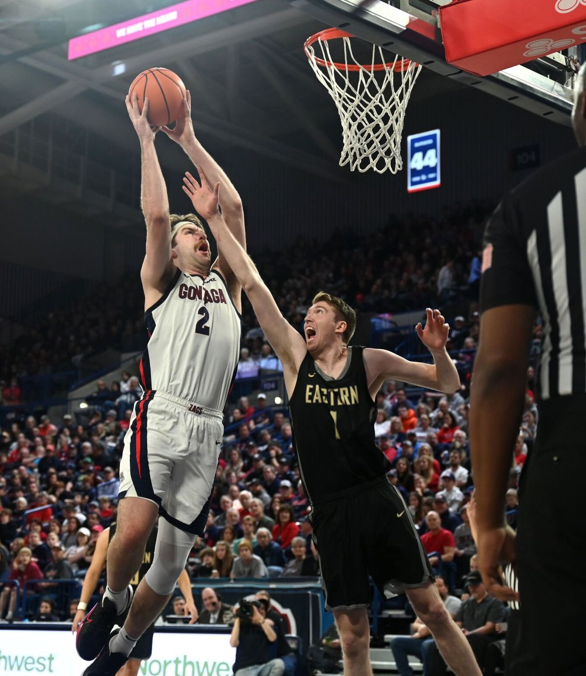 Gonzaga’s Drew Timme (2) heads to the basket defended by Eastern Oregon’s Slade Dill (1), in the non-conference game between the Eastern Oregon Mountaineers and the Gonzaga Bulldogs in the McCarthey Athletic Center Wednesday, Dec . 28, 2022 at Gonzaga University in Spokane, Washington. The Zags took care of the Mountaineers 120-42.  (JESSE TINSLEY/THE SPOKESMAN-REVIEW)