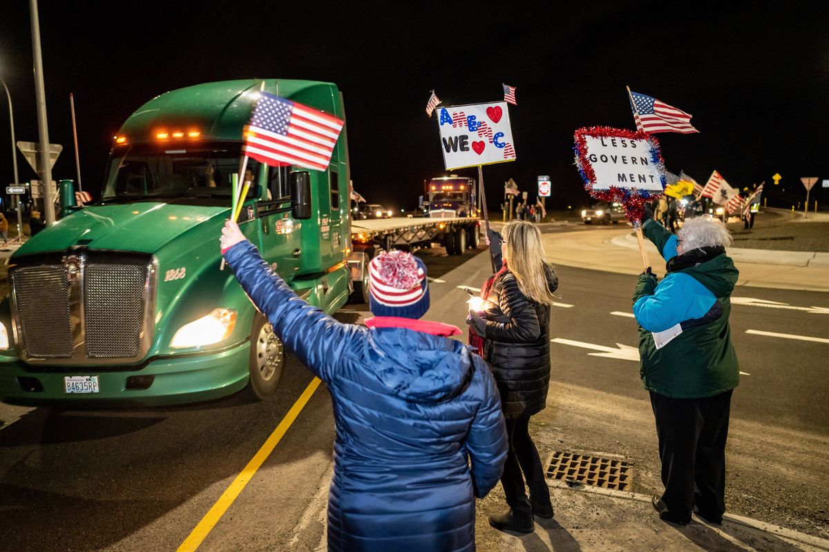 The Freedom Convoy is greeted by supporters as they arrive at the Petro fuel station off of Interstate 90 at the Medical Lake exit. Local volunteers and businesses came together to feed the truckers Tuesday when they overnighted at the truck stop.  (COLIN MULVANY/THE SPOKESMAN-REVIEW)