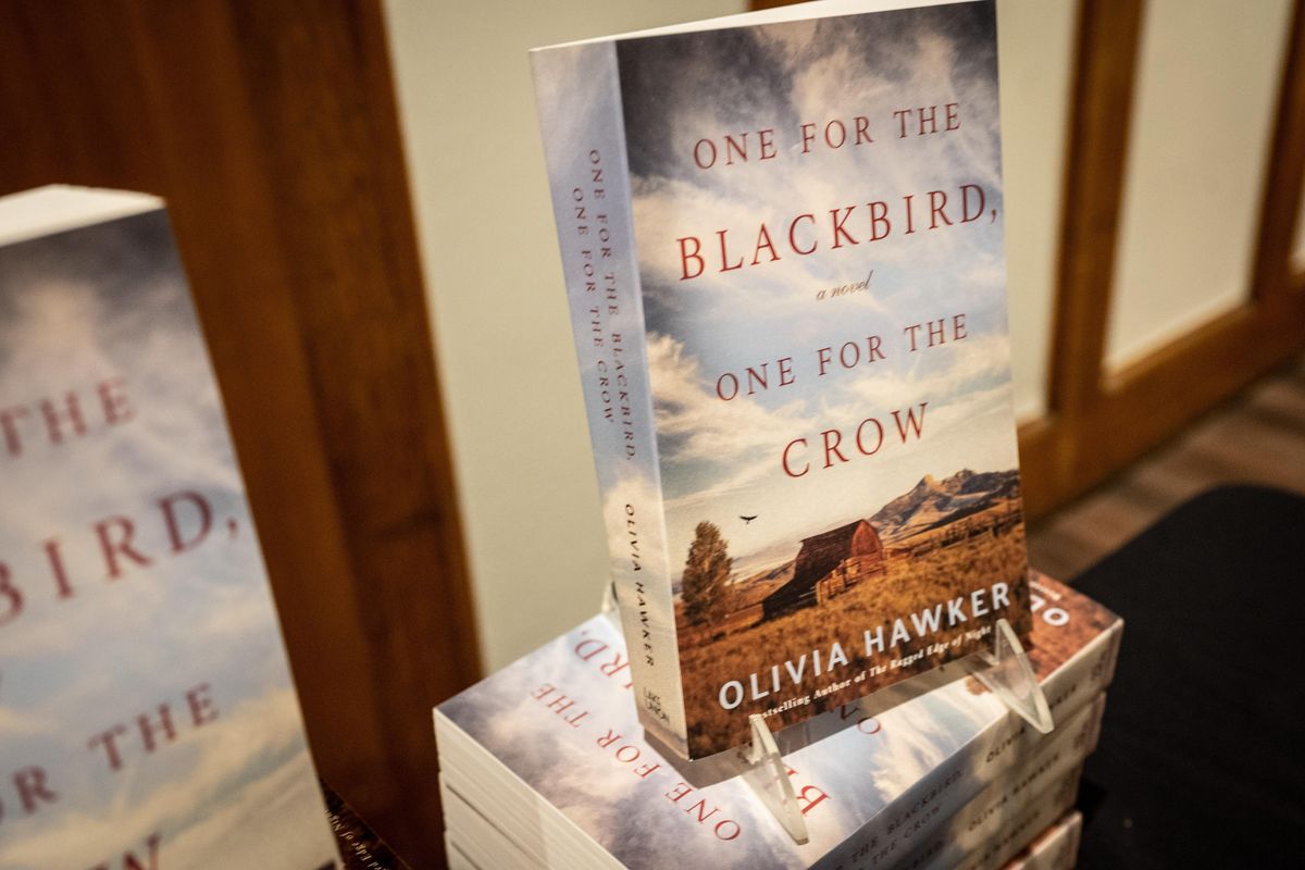Author Libbie Grant, who writes under the pen names L.M. Ironside, Libbie Hawker and Olivia Hawker, has a new book “One for the Blackbird, One for the Crow.” She had a conversation with Kristi Burns during the Northwest Passages Book Club held, Tues. Dec. 3, 2019, at The Montvale Event Center. (Colin Mulvany / The Spokesman-Review)