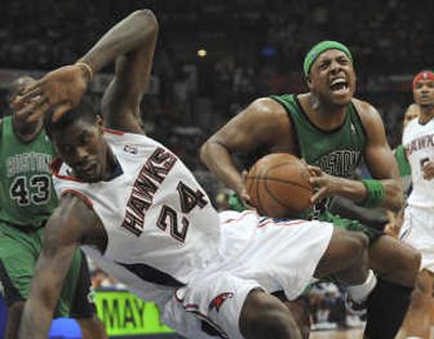 
Celtics' Paul Pierce, right, collides with Hawks' Marvin Williams. Associated Press
 (Associated Press / The Spokesman-Review)