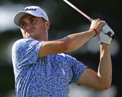 Justin Thomas watches his tee shot on the 17th hole during the third round of the Bridgestone Invitational golf tournament at Firestone Country Club, Saturday, Aug. 4, 2018, in Akron, Ohio. (David Dermer / Associated Press)