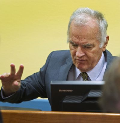 Former Bosnian Serb military commander Gen. Ratko Mladic is seen at the start of his trial at the Yugoslav war crimes tribunal in The Hague, Netherlands, Wednesday. (Associated Press)