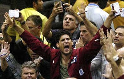 
Traders work the S&P 500 Futures pit at the Chicago Mercantile Exchange Wednesday as stocks surged into triple-digit gains early in the day after the general election, a reaction to a victory by President Bush. 
 (Associated Press / The Spokesman-Review)