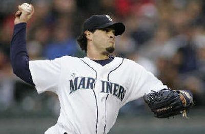 
Mariners starting pitcher Joel Pineiro works in the first inning. 
 (Associated Press / The Spokesman-Review)