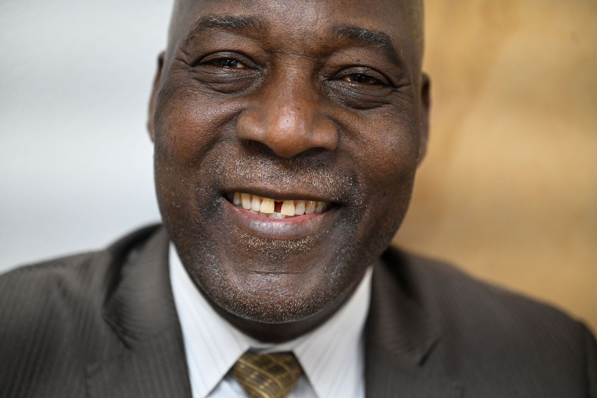 Rev. Luc Jasmin Jr., is all smiles after a service in Creole and English with members of the Haitian community who fear losing their temporary protected status at Maranatha Evangelical Church on Feb. 23, 2025, in Spokane.  (DAN PELLE/FOR THESPOKESMN-REVIEW)
