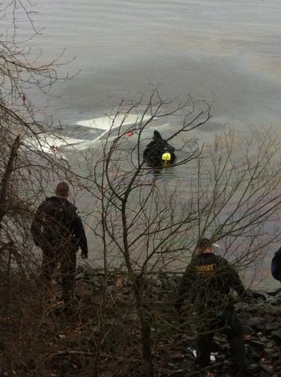 A car went into Lake Coeur d'Alene off Coeur d'Alene Lake Drive the afternoon on Dec. 20, 2104. Two passers-by rescued the driver from the cold water.  (Kootenai County Sheriff's Office)
