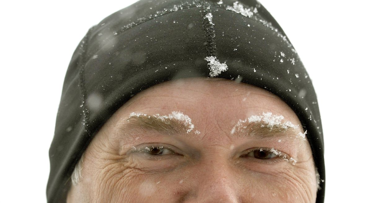 Robert Graper, 48, of Spokane, got his eyebrows covered in snow during his 3.5 mile run along 25th Avenue during the snowstorm that hit on Wednesday, Feb. 23, 2011.  Graper said it was his first day out running in a long time. "It